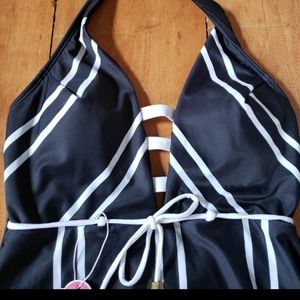 Black and white striped one piece bathing suit